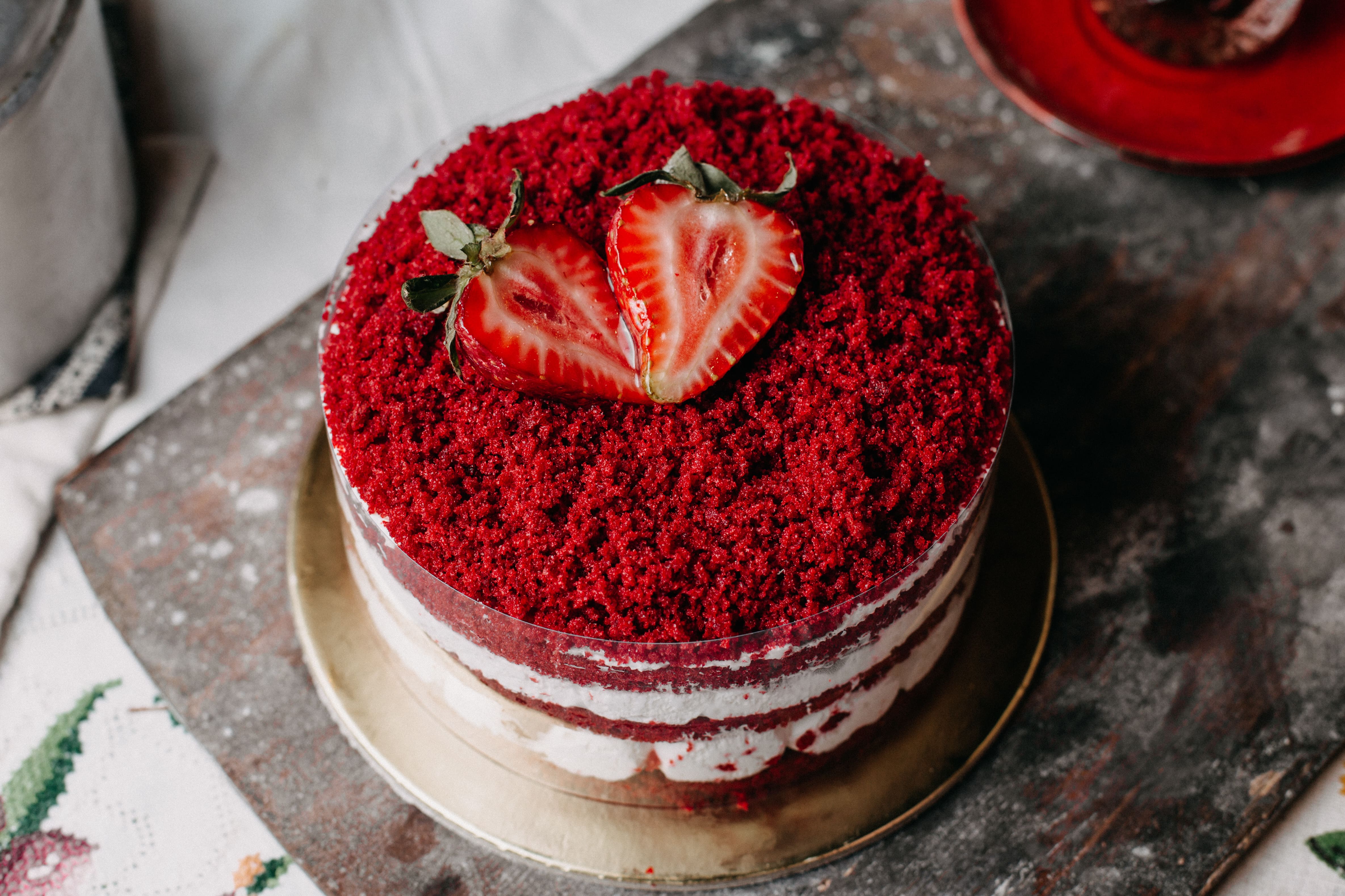 Red velvet cake topped with strawberries